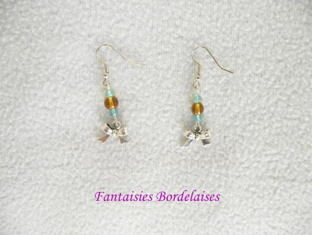 Boucles d'oreilles noeud papillon avec perles turquoise et topaze